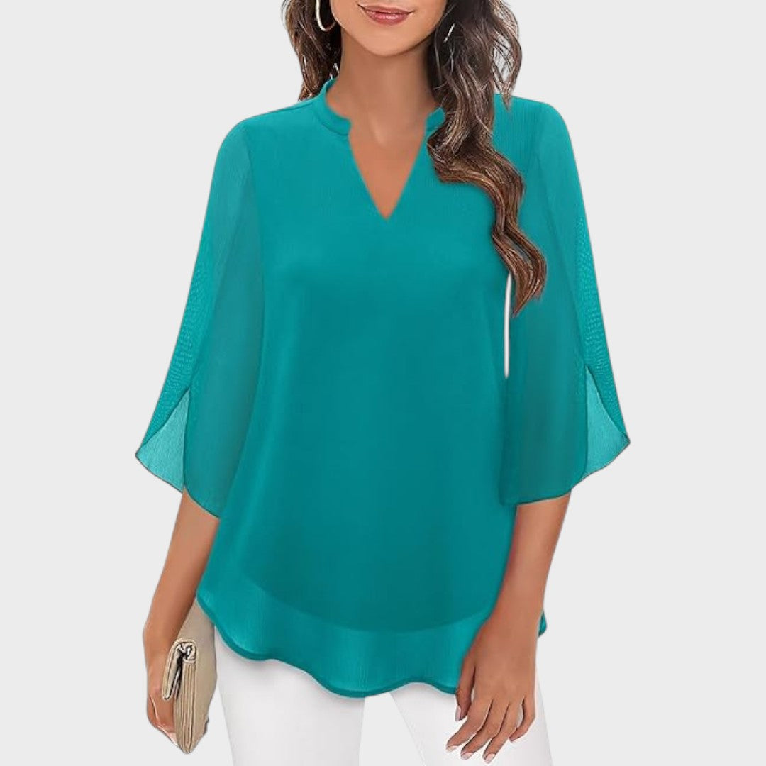 ELENA – ELEGANTE BLOUSE MET V-HALS EN LUCHTIGE UITSTRALING