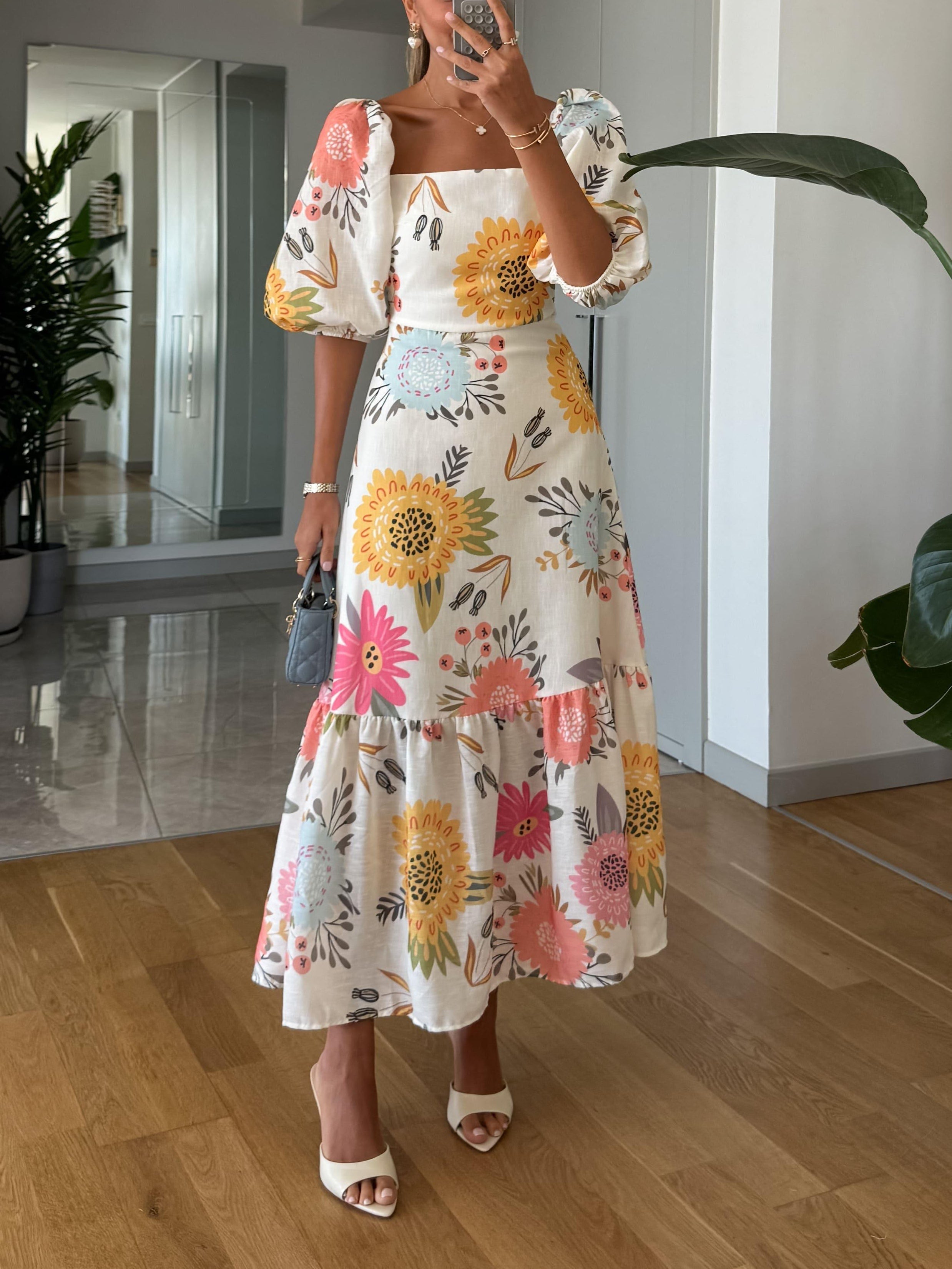CAMILLE – BLOEIENDE ELEGANTIE JURK MET PUFFMOUWEN